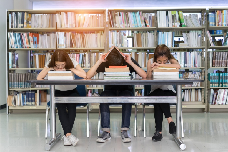 Young Student Group Reading Book Serious, Hard Exam, Quiz, Test Sleeping  headache worry in Classroom Education Library University Knowledge center